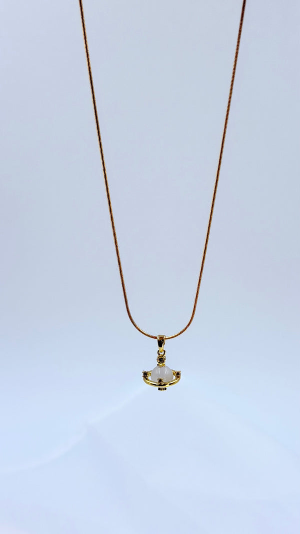 Golden orbit pendant